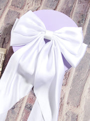 Furling Pompoms, noeud satin blanc, touche lumineuse pour cérémonie.