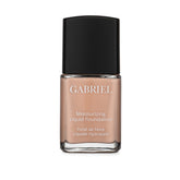 Gabriel Cosmetics fond de teint liquide, flacon rose-beige, offre une couvrance naturelle et hydratante.