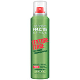 Garnier Fructis Texture Tease: bouteille montrant la poudre minérale pour du volume léger.