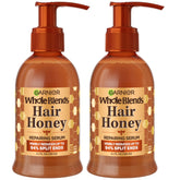 Sérum Hair Honey de Garnier, bouteille sans pompe, réparation rapide des pointes.