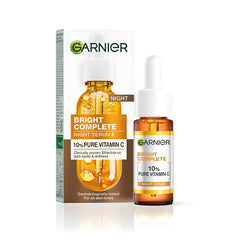 Sérum Garnier Nuit vitamine C10 et hyaluronique dans bouteille, éclaircit les taches visibles.