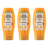 Garnier Whole Blends argan camellia, brillance visible sur cheveux après utilisation.