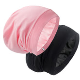 Bonnet GB Selected en satin noir et rose – vue avant, protège les cheveux pendant la nuit.