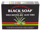 Genuine African Formula Black Soap bar texture showing moisture from shea butter.