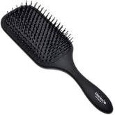 Brosse Giorgio Detanglage démêle en douceur sans casser les nœuds.