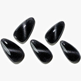 GLAMERMAID onglets press-on œil de chat noir avec finition brillante.