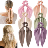 Élastique satin Glaudmeiss avec noeud, confort doux et tenue polyvalente.