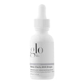 Glo Skin Beauty Beta-Clarity Drops flacon sur plan de toilette, teint plus clair