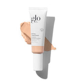 Glo Skin Beauty primer teinté clair, bouteille, protection SPF 30 et éclat.