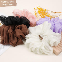 GOLD XIONG PADISHAH scrunchie chiffon XL autour du poignet, accessoire couleur et praticité