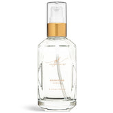 Sérum Goldie Locks Signature – bouteille ouverte prête à l’application, brillance naturelle sans résidu.