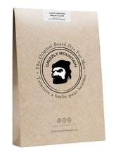 Grizzly Mountain Beard Dye: bouteille teinture brun clair pour barbe, application facile et naturelle.