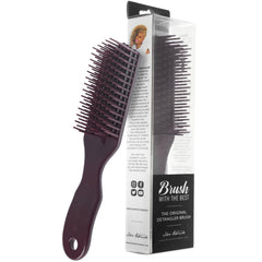 Gros plan des poils flexibles de la brosse Maroon, démêlage en douceur.