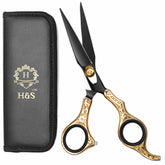 Ciseaux professionnels H&S GoldBlack Series 6,5 pouces pour des coupes nettes et précises.
