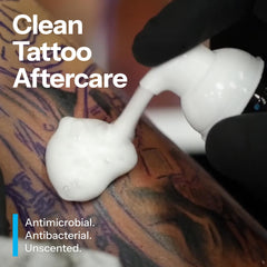 H2Ocean blue-green foam soap application near tattoo