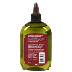 Hair Chemist Pro-Croissance application huile ricin montre l’application sur les cheveux.