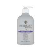 Hairitage Pass sur le Brass Purple Shampooing – Bouteille pour neutraliser les reflets chauds et hydrater les cheveux colorés.