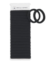 La bande Heliums sans couture noire offre un maintien doux sans tiraillement.