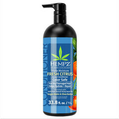 Hempz Biotin Conditionneur : bouteille montrant hydratation triple et parfum agrume.