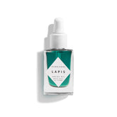 HERBIVORE Lapis Huile Visage: bouteille élégante favorisant équilibre cutané.