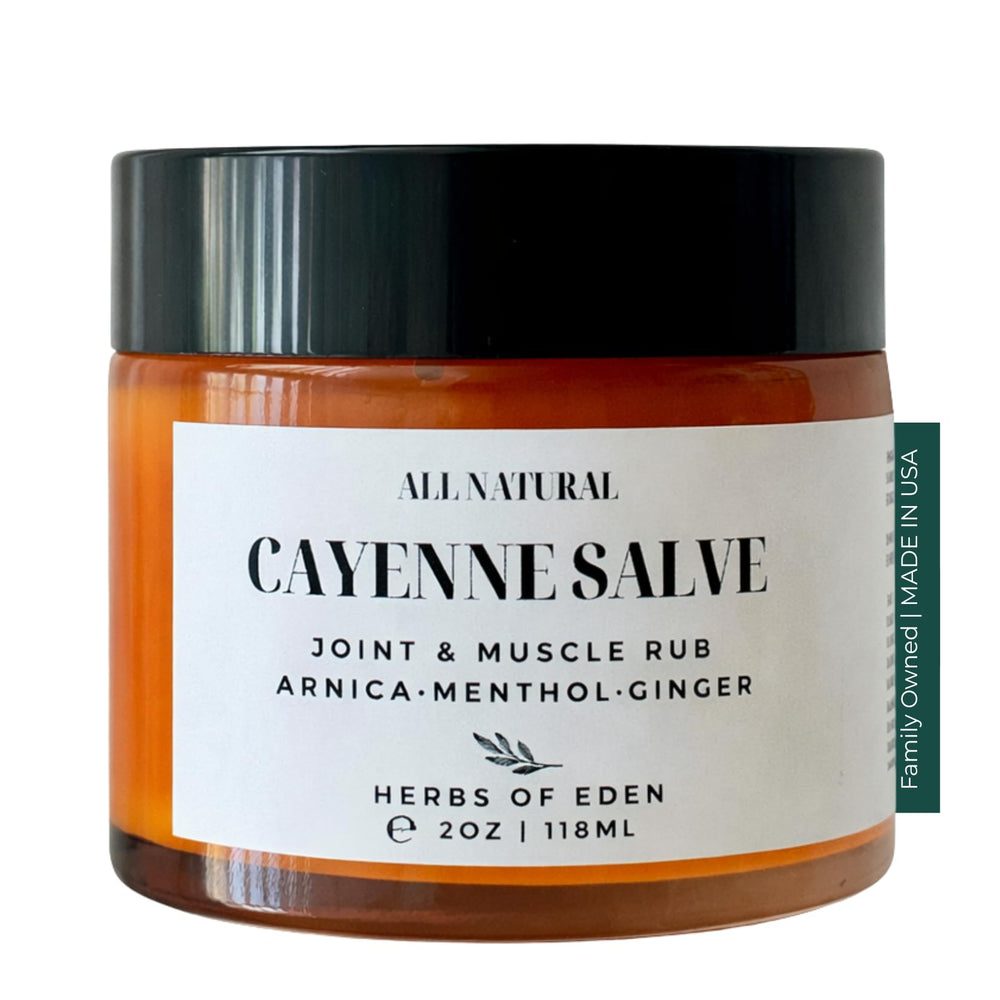 Herbs of Eden Baume Cayenne Arnica dans un bocal en verre, utilisation topique apaisante.