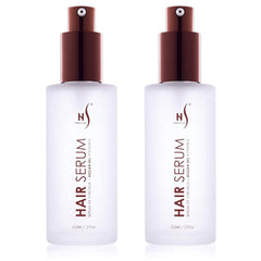 Herstyler Argan Oil Serum bottle glistens with natural shine for all hair types.