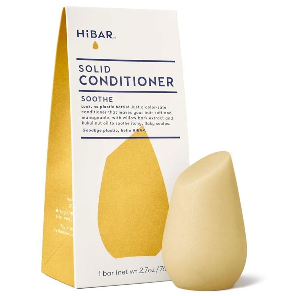 HiBAR barre apaisante tenue dans la main, douceur pour le cuir chevelu.