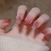 Ongles pressés Hkanlre papillon rose dégradé pour un look frais et élégant.