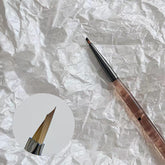 Pinceau HNRongkya pour nail, pétales et papillons, précision des détails.