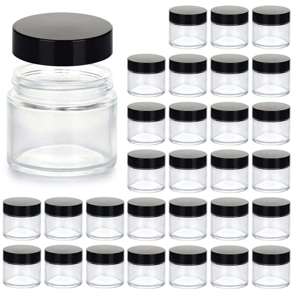 Bocal Hoa Kinh 2oz avec bouchon noir, parfait pour stocker crèmes et lotions en voyage.