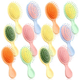 Brosse HOFASON mini 12 pièces rose, démêlage en voyage sans effort.