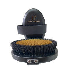 Brosse HOT HAVEN à brins cuivre ionique pour exfolier et revitaliser la peau.