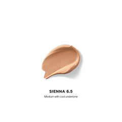 Hourglass Vanish Airbrush Concealer, texture légère pour un mélange sans effort.