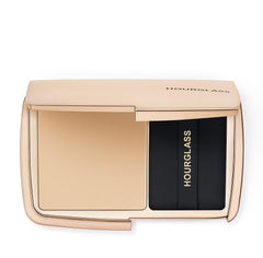 Hourglass Vanish Poudre Translucide Compacte: fini mat et retouche instantanée.