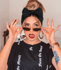 Huachi bandeau turban noeud arriere, couvre le front avec style.