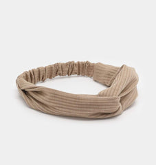 Bandeau Huachi croisé en turban, style polyvalent pour sport et plage.
