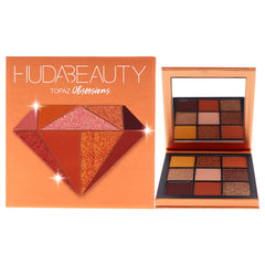 Huda Obsessions Topaz palette ouverte, couleurs riches pour looks jour et nuit.