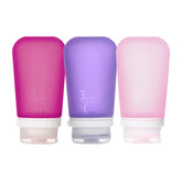 Humangear GoToob+ en rose, bouteille réutilisable pratique pour les voyages et le plein air.