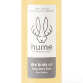 HUME SUPERNATURAL spray huile sèche, flacon prêt à hydrater rapidement après la douche.