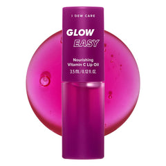 I DEW CARE gloss à lèvres Raspberry, bouteille rose, teinte brillante et hydratante.