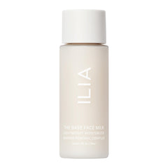 ILIA Base Face Milk Essence dans une bouteille voyage, hydratation légère possible.