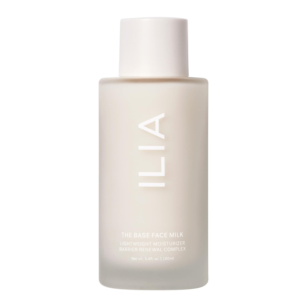 Flacon ILIA Base Face Milk Essence prêt à hydrater et apaiser la peau.