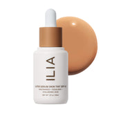 ILIA Super Serum Skin Tint SPF40 : flacon prêt à l’emploi et hydratation légère.