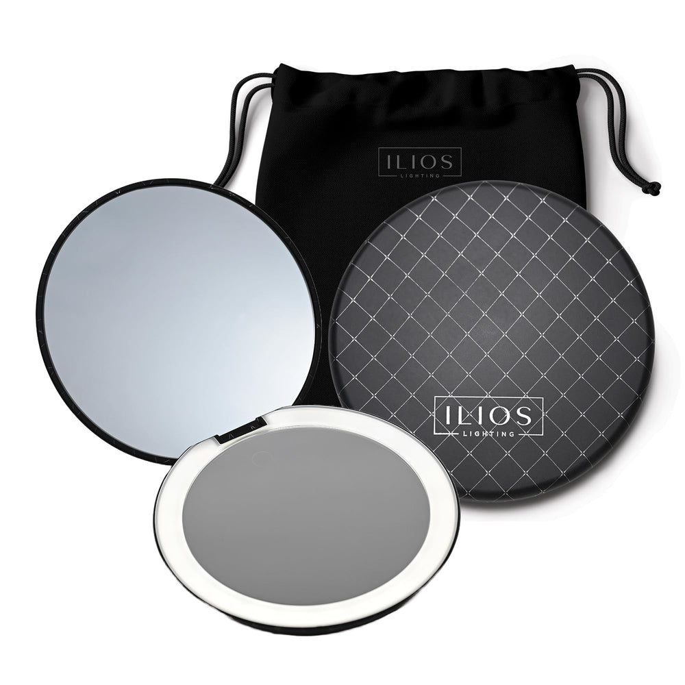 Miroir compact LED Ilios Lighting noir avec 1x et 10x, idéal pour retouches précises en voyage.