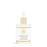 Sérum brillant INNERSENSE en bouteille – éclat durable pour tous types de cheveux.