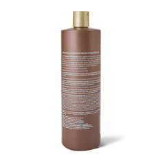 Ion Shampoing lissage kératine, étiquette visible, hydratation améliorée pour cheveux.