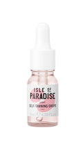Gouttes Isle of Paradise, flacon et pipette pour une application précise sur visage et corps.