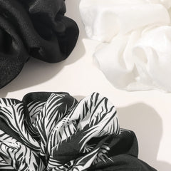 Ivyu scrunchie satin pour sport et activités quotidiennes.