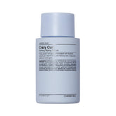 Bouteille du sérum Blue Crazy Curl de J Beverly Hills prête à définir les boucles.