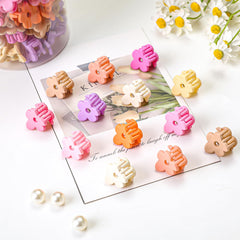 JANFUN pinces-cheveux-fleurs-mini pêche, apporte une touche estivale et pratique.